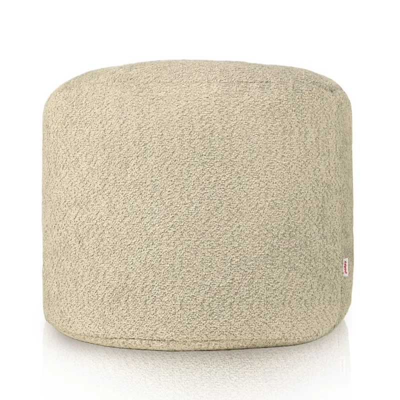 Bežová pufa cilindro boucle, elegáns és praktikus kiegészítő a nappaliba